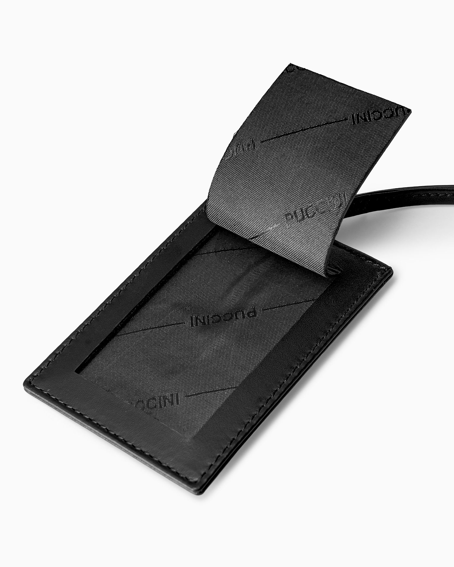 Etichetă pentru bagaje din piele neagră